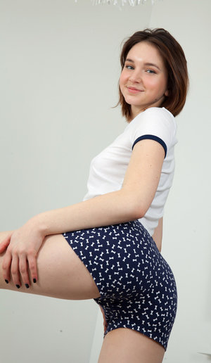 18 year old girl Barbie Bree strips to pink leg warmers in her bedroom